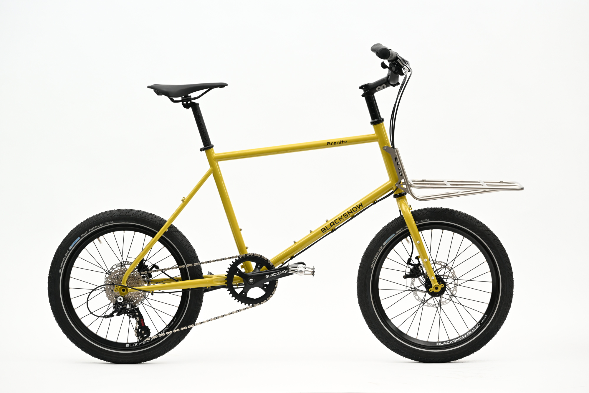 Granite Pro with loaded front panniers on gravel road