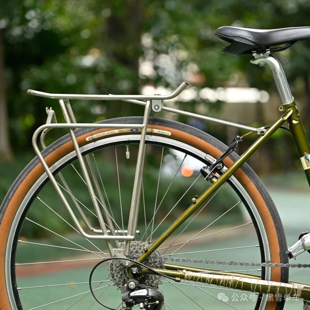 Parent riding with child on RC01-equipped bicycle